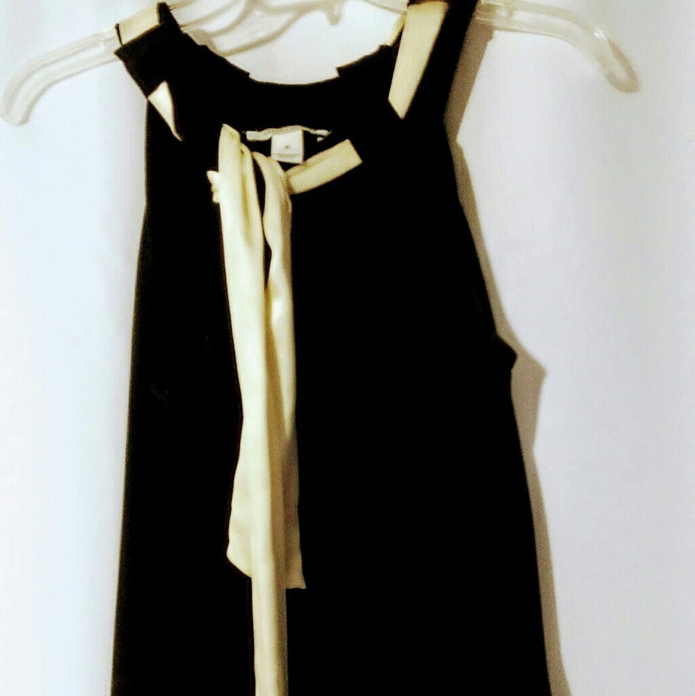 Dressy black with cream bow blouse.